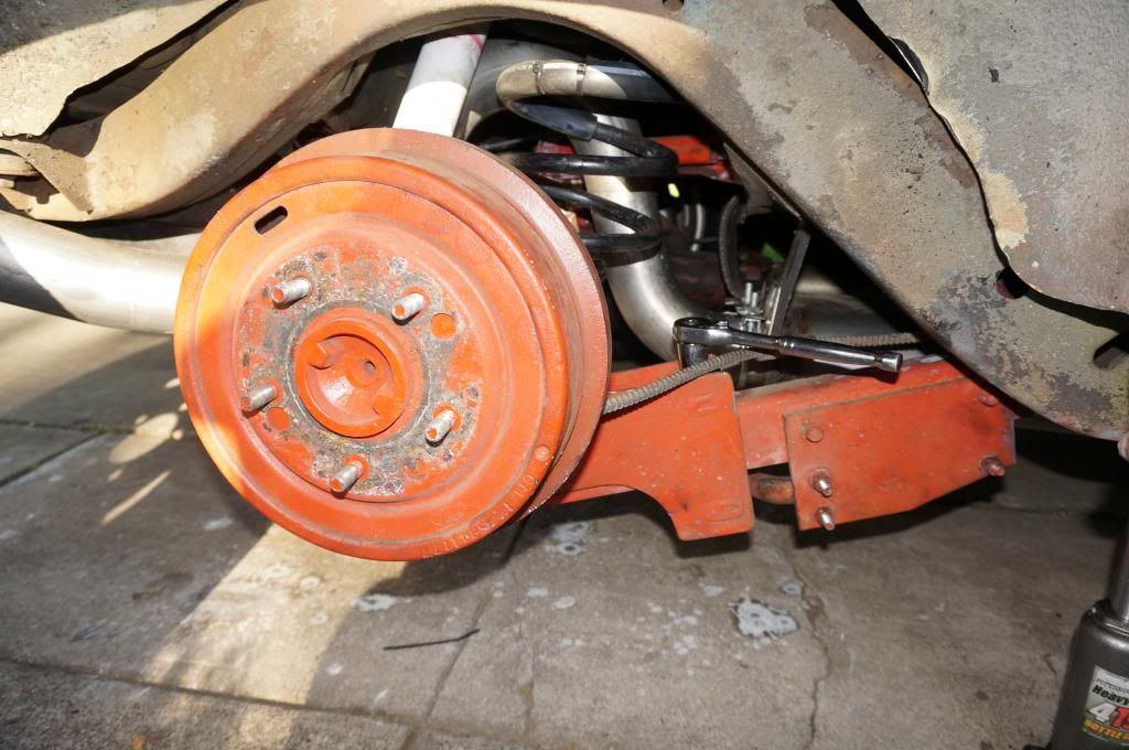 Identify Lower Trailing Arm Relocation Brackets w/ Locking Range Bolts